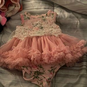 This is a cute 0-3 dress.